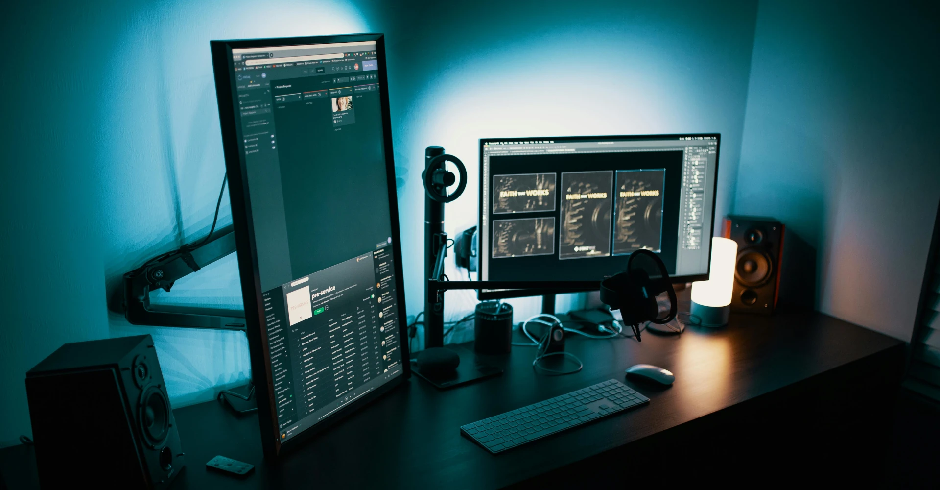 two computer screens on a desk