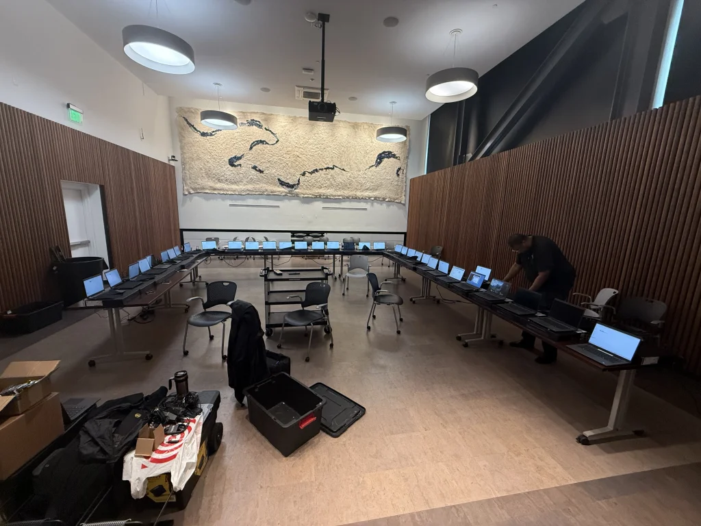Computers set out around tables