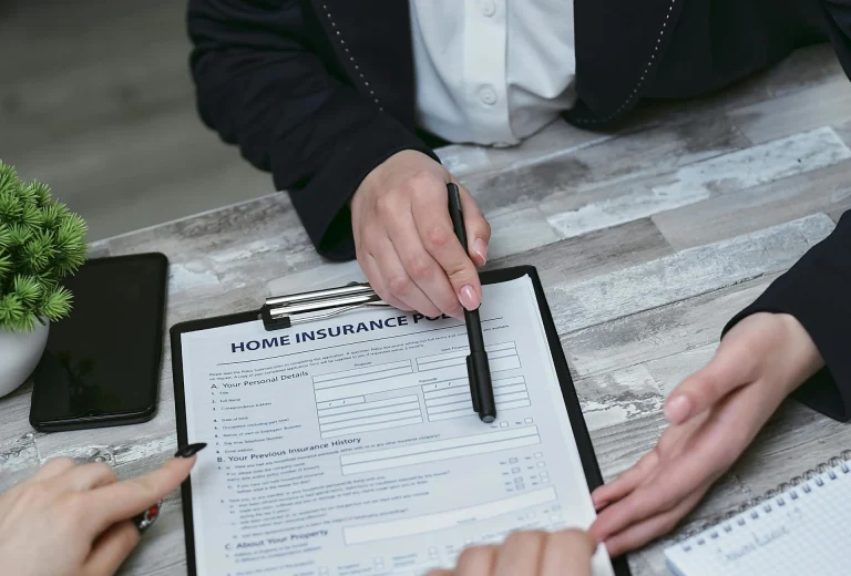 Insurance paperwork on a clipboard